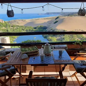 https://casa-vacanze-ester-casa-con-terrazza-vista-mare-e-dune.in-sardinia.net
